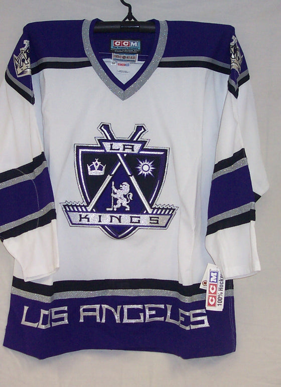 GAME WORN LA KINGS WHITE AND PURPLE JERSEY LEWIS